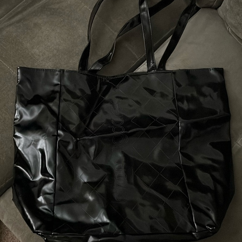 Black Bloomingdale's tote bag with leopard trim